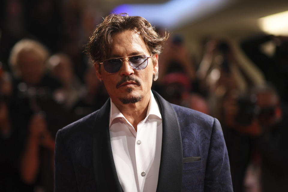 Actor Johnny Depp poses for photographers upon arrival at the premiere of the film 'Waiting for the Barbarians' at the 76th edition of the Venice Film Festival, Venice, Italy, Friday, Sept. 6, 2019. (Photo by Arthur Mola/Invision/AP)