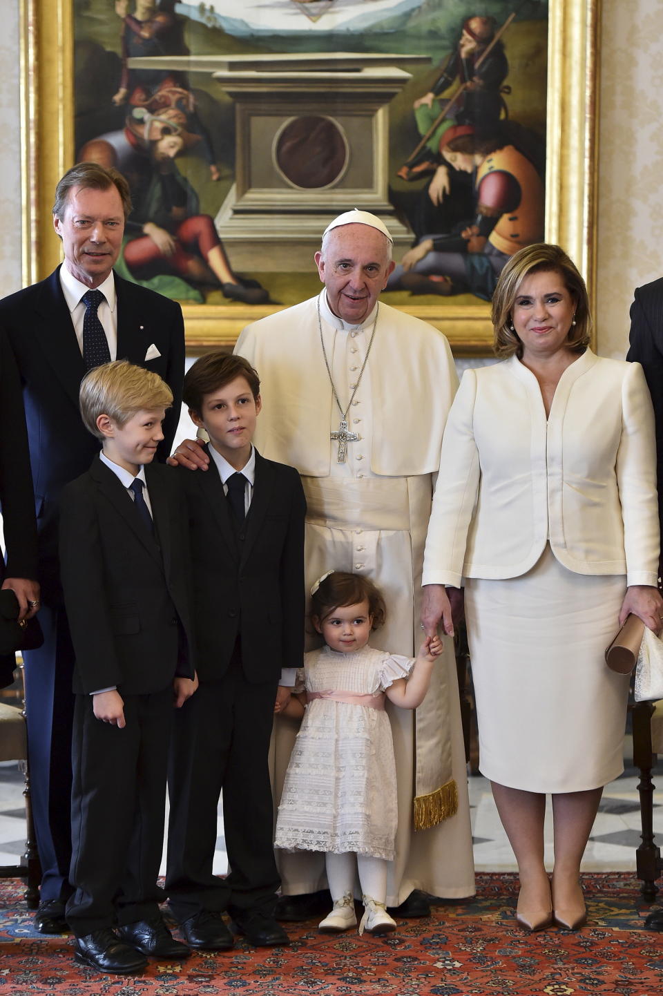 Pope Francis with Luxembourg's Grand Duke Henri, Grand Duchess Maria Teresa and three of their grandchildren at the Vatican in 2016. Women traditionally had to wear a full-length dress when meeting the pope at the Vatican, but that rule has been relaxed.