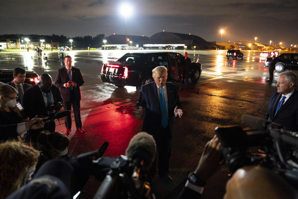 President Donald Trump talks with reporters at Andrews Air Force Base after attending a campaign rally in Latrobe, Pa., Thursday, Sept. 3, 2020, at Andrews Air Force Base, Md. (AP Photo/Evan Vucci)