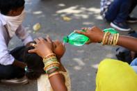 Migrants rest as they walk towards their native places during the nation wide lockdown imposed due to deadly novel coronavirus pandemic in Jaipur,Rajasthan, India,May 13,2020.(Photo by Vishal Bhatnagar/NurPhoto via Getty Images)