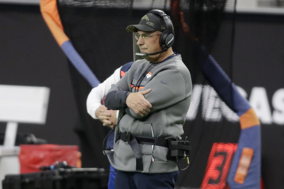 Denver Broncos head coach Vic Fangio watches from the sideline during the first half of an NFL football game against the Las Vegas Raiders, Sunday, Nov. 15, 2020, in Las Vegas. (AP Photo/Isaac Brekken)