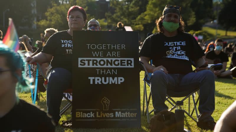 People protest against racial injustice near the site of a rally by U.S. President Donald Trump in Tulsa
