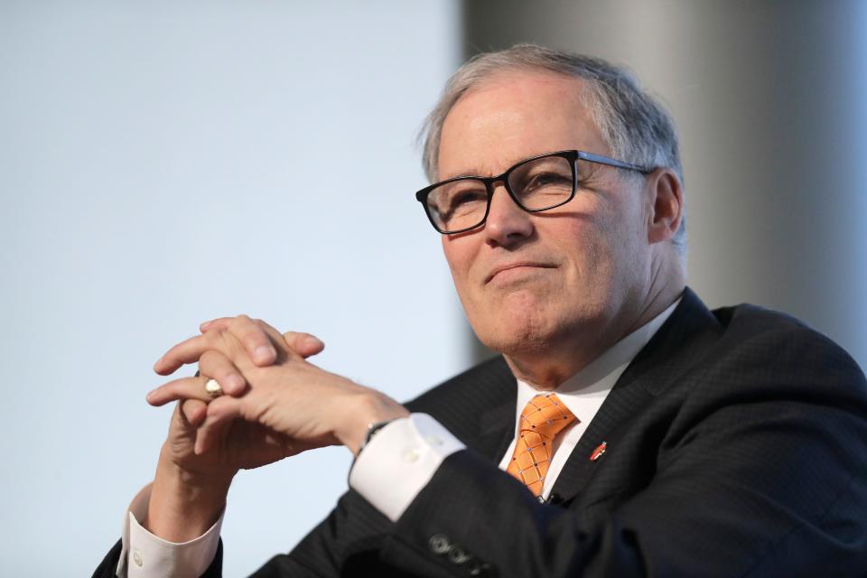 In this March 6, 2019 file photo, Washington Gov. Jay Inslee listens as he takes part in a non-partisan panel discussion titled 