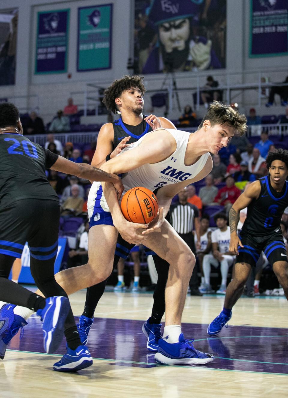 Olivier Rioux of IMG Academy tries to go up for a shot against Richmond Heights in the City of Palms Classic on Wednesday, Dec. 20, 2023, at Suncoast Credit Union Arena in Fort Myers.