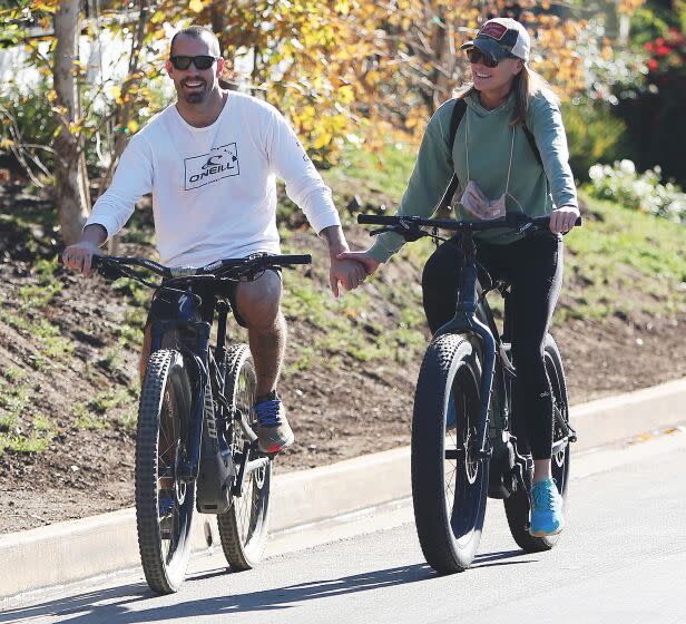 Clement Giraudet and Robin Wright are seen biking on November 28, 2020 in Los Angeles, Calif.