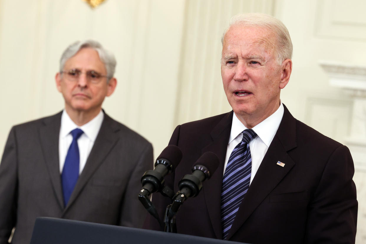 Joe Biden, right, with Merrick Garland