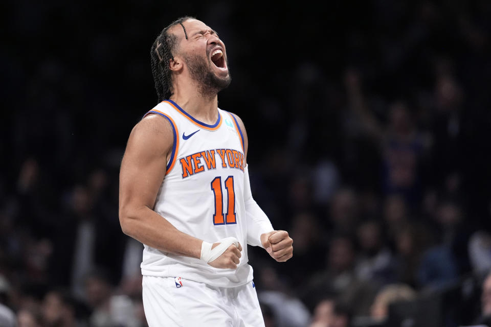 New York Knicks guard Jalen Brunson reacts after making a 3-pointer during the second half of the team's NBA basketball game against the Brooklyn Nets, Tuesday, Jan. 23, 2024, in New York. (AP Photo/Mary Altaffer)