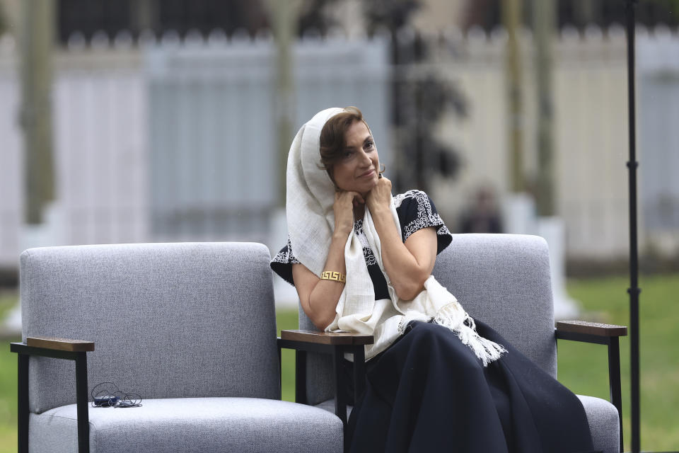 Unesco Director General Audrey Azoulay listens to First Lady Jill Biden during a ceremony at the UNESCO headquarters Tuesday, July 25, 2023 in Paris. U.S. first lady Jill Biden is in Paris on Tuesday to attend a flag-raising ceremony at UNESCO, marking Washington's official reentry into the U.N. agency after a five-year hiatus. (AP Photo/Aurelien Morissard, Pool)