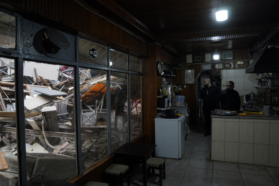 Damaged shops are seen in Duzce, Turkey, Wednesday, Nov. 23, 2022, after a magnitude 5.9 earthquake hit a town in northwest Turkey early Wednesday, causing damage to some buildings and widespread panic. (AP Photo/Khalil Hamra)