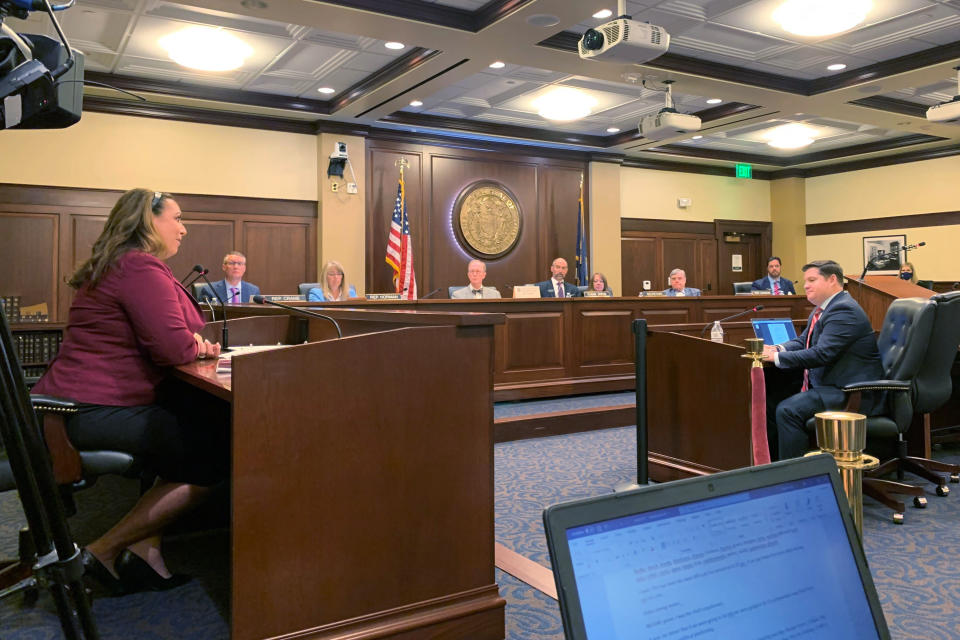 Democratic Rep. Brooke Green of Boise, far left, testifies before the Idaho legislature's ethics committee in a hearing Monday, Aug. 2, 2021, in Boise, Idaho, to determine if Rep. Priscilla Giddings, a Republican, acted inappropriately when she publicized the name and photo of a woman who said she was raped by another lawmaker. Green was one of about 25 lawmakers who signed on to ethics complaints against Giddings. (AP Photo/Rebecca Boone)