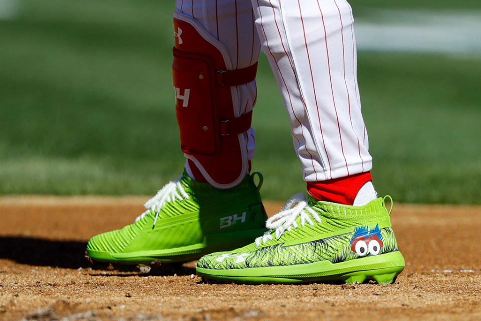 The cleats of Philadelphia Phillies' Bryce Harper are seen during the first inning of an opening day baseball game against the Atlanta Braves, in PhiladelphiaBraves Phillies Baseball, Philadelphia, USA - 28 Mar 2019