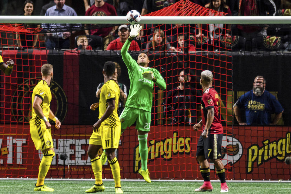 Columbus Crew goalkeeper Zack Steffen (23) defends the goal during the first half of an MLS playoff soccer game against Atlanta United, in Atlanta, Thursday, Oct. 26, 2017. (AP Photo/Danny Karnik)