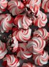 <p>A cookie box filled with a wide assortment of shapes, sizes and colors is such a treat to gift during the holidays. These peppermint <a href="https://www.delish.com/cooking/recipe-ideas/a23053370/meringue-cookies-recipe/" rel="nofollow noopener" target="_blank" data-ylk="slk:meringues;elm:context_link;itc:0;sec:content-canvas" class="link ">meringues</a> are the perfect addition to add a pop of color and fun. They practically scream “holiday!” and they taste fantastic as well.<br><br>Get the <strong><a href="https://www.delish.com/cooking/recipe-ideas/a41330758/peppermint-meringues-recipe/" rel="nofollow noopener" target="_blank" data-ylk="slk:Peppermint Meringues recipe;elm:context_link;itc:0;sec:content-canvas" class="link ">Peppermint Meringues recipe</a></strong>.</p>