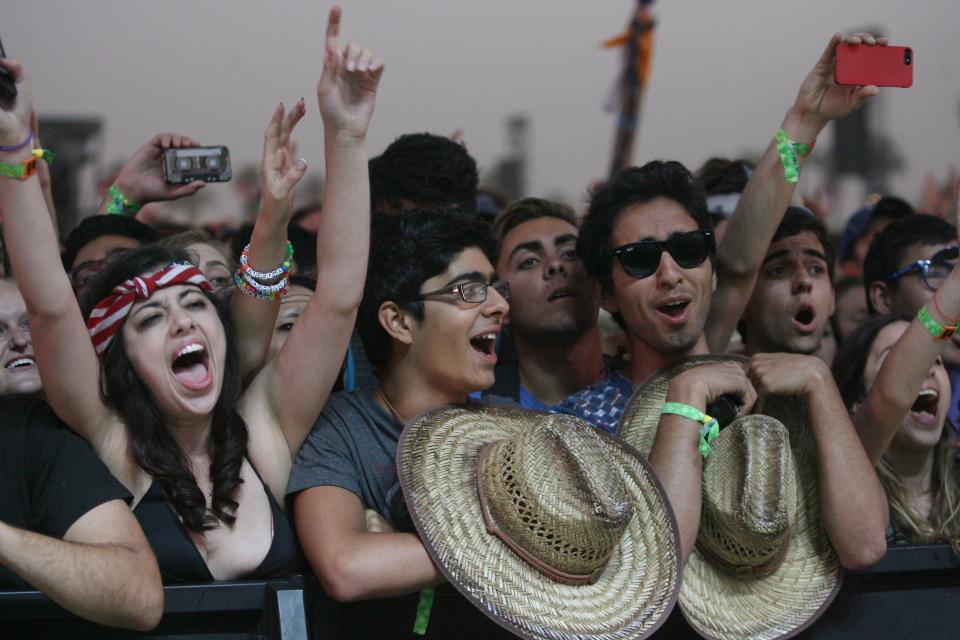 Fans cheer as Vampire Weekend performs on the Main Stage during the Coachella Valley Music and Arts Festival at the Empire Polo Fields on Sunday, April 14, 2013 in Indio, Calif.