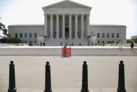 A lone demonstrator protests against gay marriage in front of the U.S. Supreme Court building June 23, 2015 in Washington, DC. The court is scheduled to issue landmark decisions on the Affordable Care Act, also known as Obamacare, and gay marriage. (Photo by Chip Somodevilla/Getty Images)