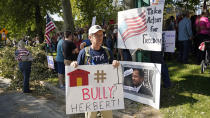 People protest Gov. Gary Herbert during an anti-mask rally outside of the Governors Mansion Saturday, Sept. 12, 2020, in Salt Lake City. (AP Photo/Rick Bowmer)