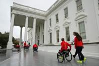 Members of U.S. Paralympics team arrive to be greeted by President Barack Obama at the White House in Washington, U.S., September 29, 2016. REUTERS/Yuri Gripas