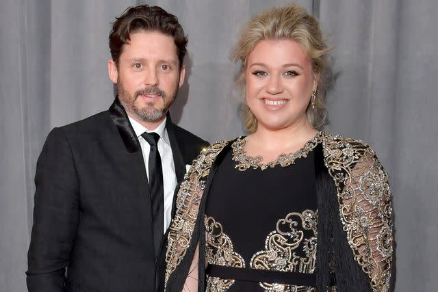 <p>Lester Cohen/Getty</p> Brandon Blackstock and Kelly Clarkson at the 60th annual Grammys at Madison Square Garden in New York City in January 2018