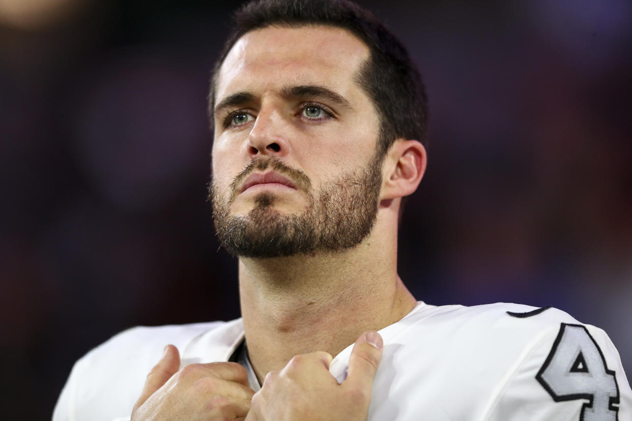 INGLEWOOD, CA - DECEMBER 8: Derek Carr #4 of the Las Vegas Raiders stands on the sidelines during the national anthem prior to an NFL football game against the Los Angeles Rams at SoFi Stadium on December 8, 2022 in Inglewood, California. (Photo by Kevin Sabitus/Getty Images)