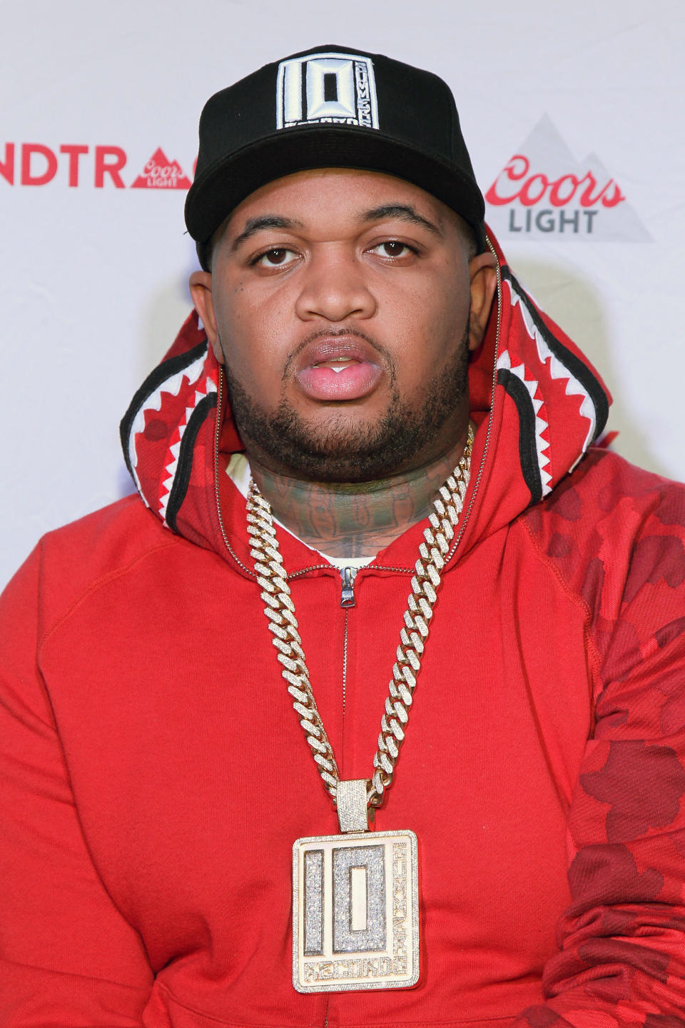 DJ Mustard looks serious