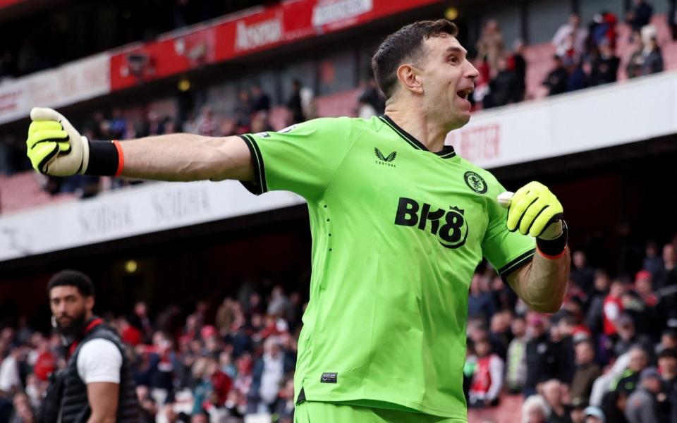 Aston Villa's Emiliano Martinez celebrates after the match