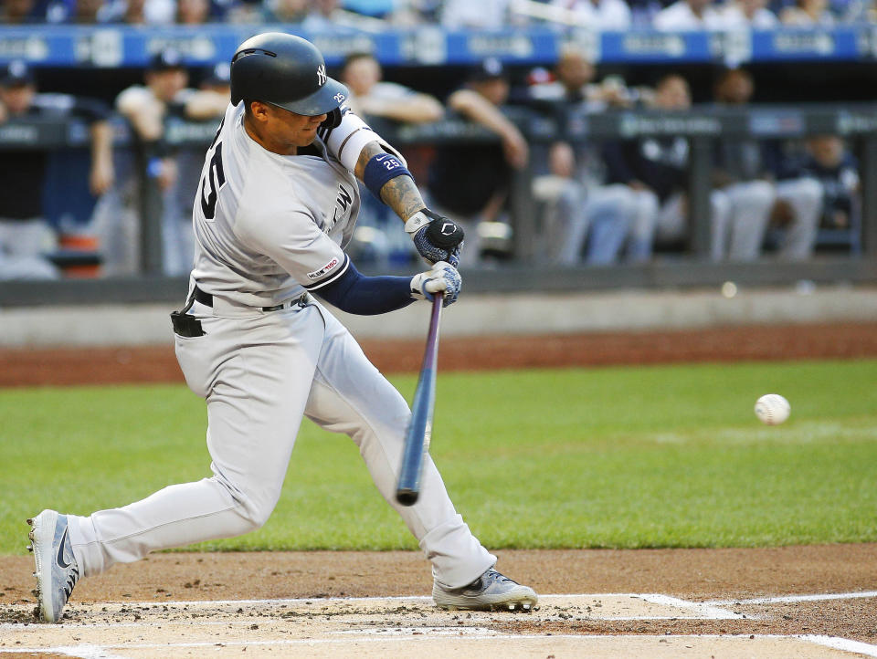 Jul 3, 2019; New York City, NY, USA; New York Yankees second baseman Gleyber Torres (25) hits an RBI single against the New York Mets during the first inning at Citi Field. Mandatory Credit: Andy Marlin-USA TODAY Sports