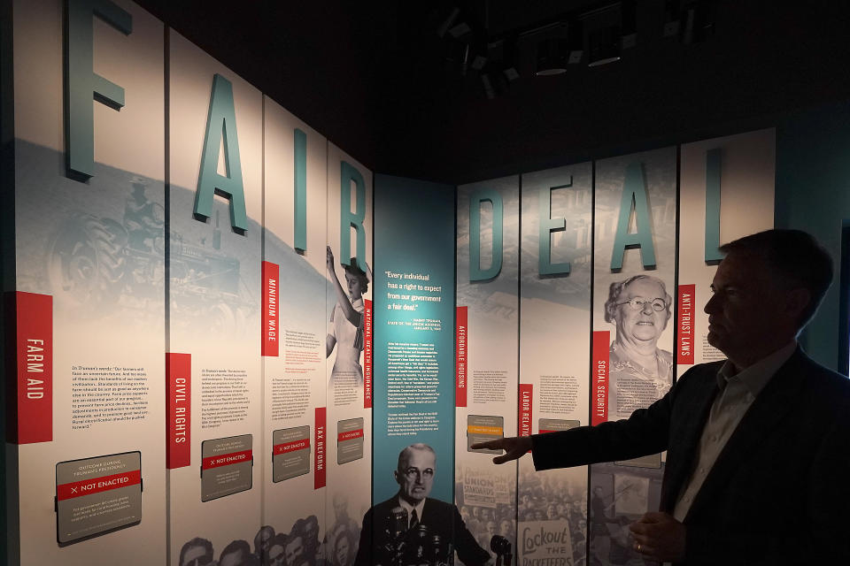 Museum director Kurt Graham talks about Harry S. Truman's social programs during a tour of the Harry S. Truman Presidential Library and Museum Wednesday, June 9, 2021, in Independence, Mo. The facility will reopen July 2 after a nearly $30 million renovation project. (AP Photo/Charlie Riedel)