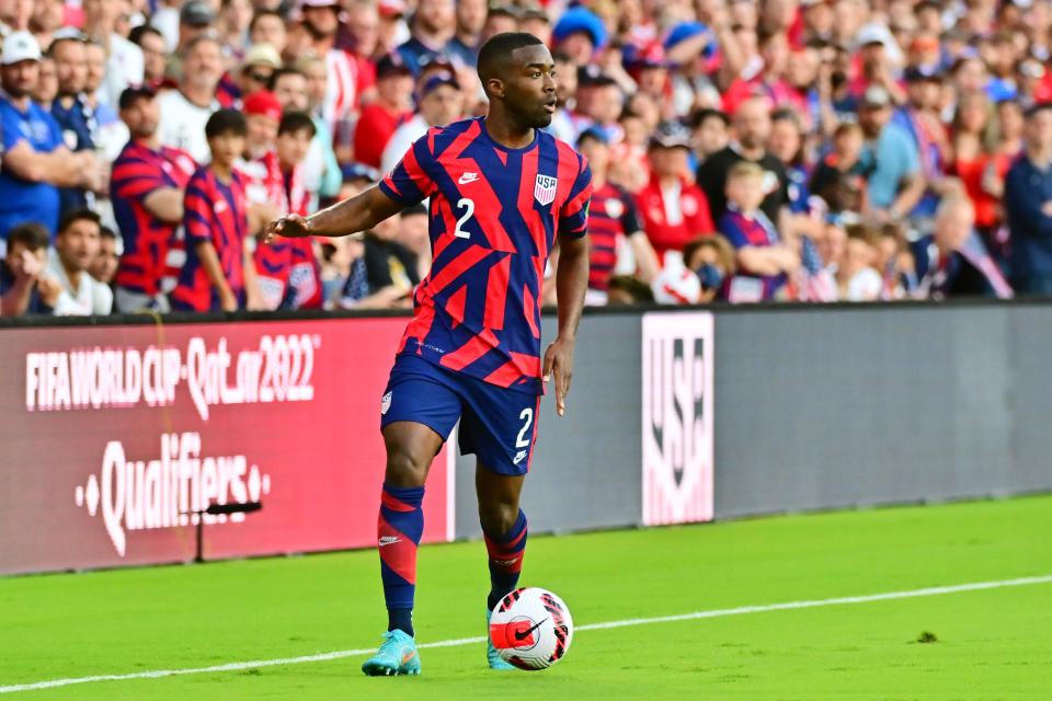 ORLANDO, FLORIDA - MARCH 27: Shaq Moore #2 of the United States dribbles the ball in the first half against Panama at Exploria Stadium on March 27, 2022 in Orlando, Florida.