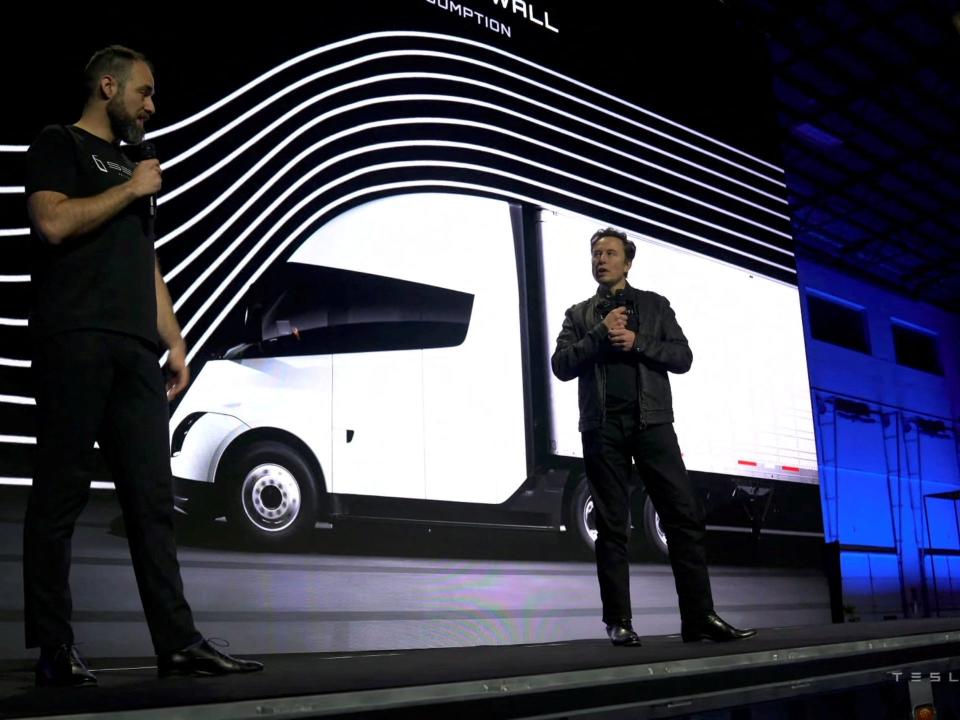 Tesla Chief Executive Elon Musk speaks with Dan Priestly, Senior Manager of Tesla Semi Truck Engineering, during the live-streamed unveiling of the Tesla Semi electric truck, in Nevada, U.S. December 1, 2022, in this still image taken from video.
