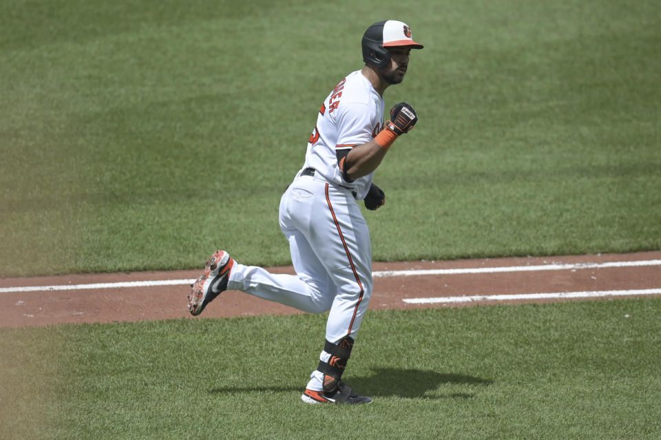 Baltimore Orioles' Anthony Santander reacts after hitting a two-run home run during the third inning of a baseball game against the Seattle Mariners, Sunday, June 25, 2023, in Baltimore. (AP Photo/Tommy Gilligan)