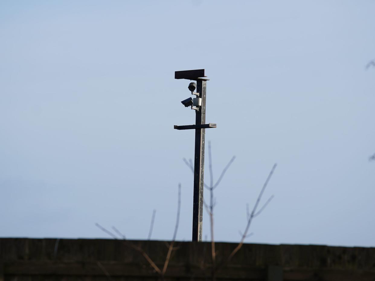 A CCTV camera near the banks of the River Wyre: but some areas are blind spots (PA)