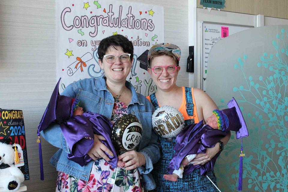 <p>Virginia Mason Franciscan Health</p> Married couple Sarah Tov and iea tov holding their twin babies