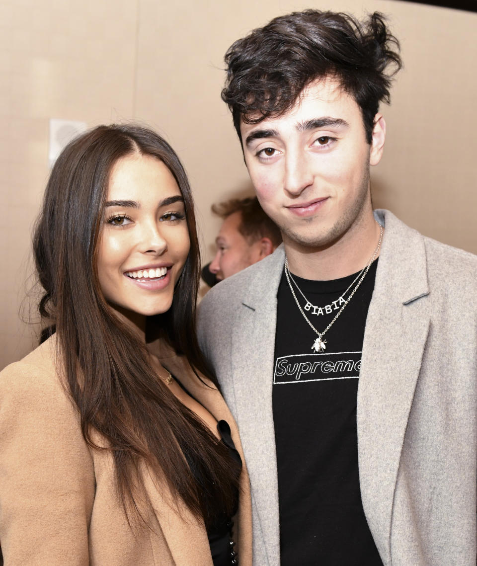 Madison and Zack smiling at a media event