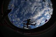 LONDON, ENGLAND - AUGUST 05: (EDITORS NOTE: THIS IMAGE WAS CREATED WITH A FISH EYE LENS) Sara Petersen of Denmark competes in the Women's 400m Hurdles Round 1 Heats on Day 9 of the London 2012 Olympic Games at the Olympic Stadium on August 5, 2012 in London, England. (Photo by Alexander Hassenstein/Getty Images)