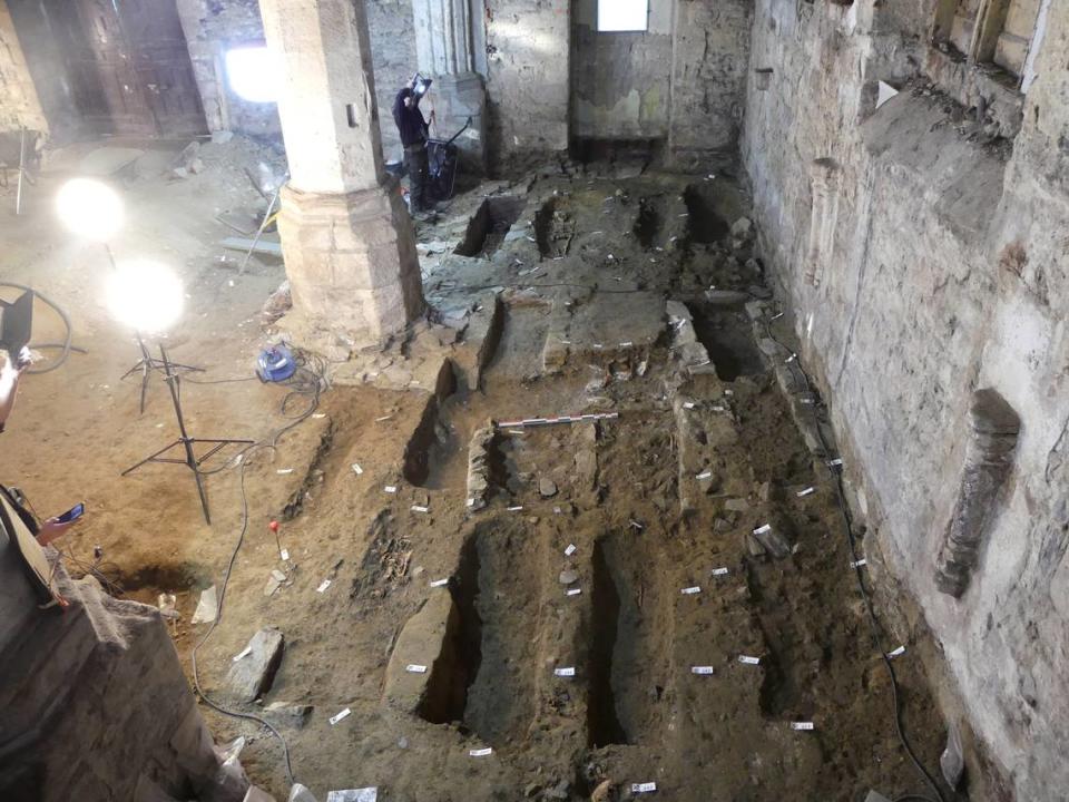 Men, women and children of all ages were found in tombs at the church, experts said.