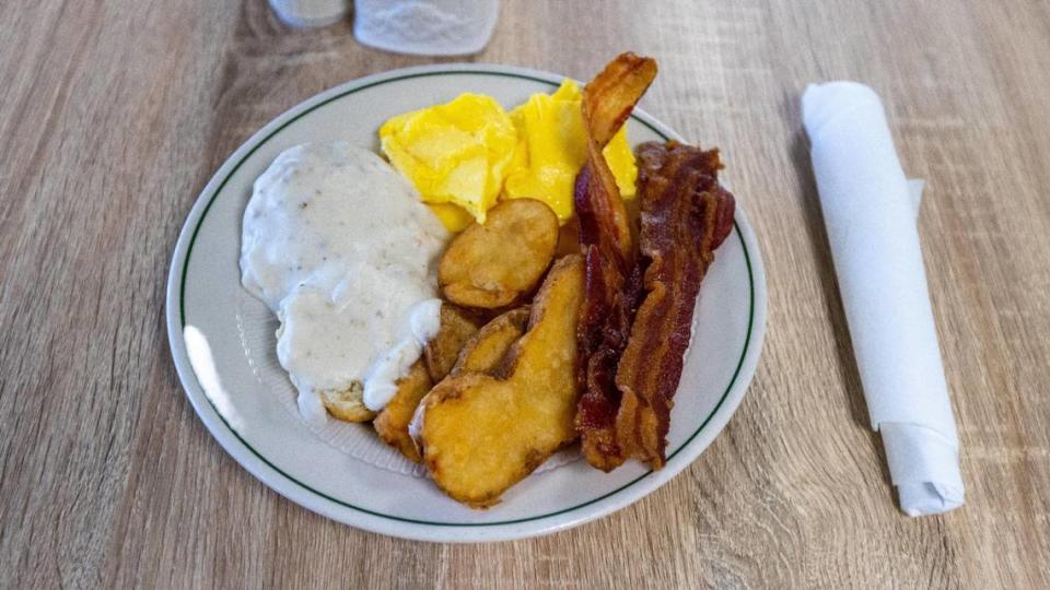 The breakfast special at Keeneland Track Kitchen with bacon, eggs, biscuits, gravy, and potatoes. March 17, 2022.