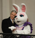 <p>President Bush hugs a person dressed as the Easter bunny at the start of the annual Easter Egg Roll, Monday, March 24, 2008, overlooking the South Lawn of the White House in Washington. (Photo:Gerald Herbert/AP) </p>