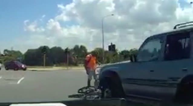 He is then pushed forward around 10 meters, but luckily the cyclist was not run over or pushed into oncoming traffic. Source: Dash Cam Owners Association/Facebook