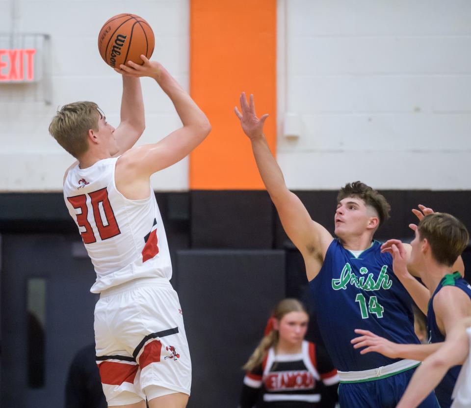 Metamora's Cooper Koch (30) competes earlier this season in the Tournament of Champions in Washington. Koch helped the Redbirds boys basketball team to the title at the Jack Tosh Tournament title on Saturday in Elmhurst.