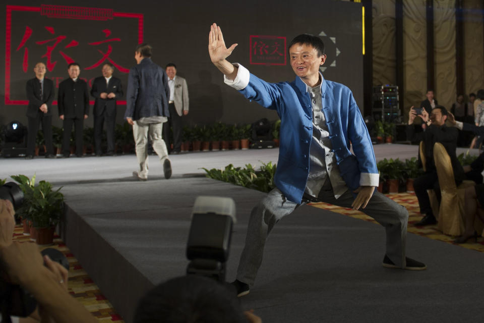 In this April 21, 2013 photo, Jack Ma, chairman of the world's largest e-commerce group Alibaba, poses during a show at the annual Summit of China Green Companies in Kunming, in southwestern China's Yunnan province. Even before Alibaba went online, the founder talked about making the fledgling e-commerce company a global player. (AP Photo) CHINA OUT