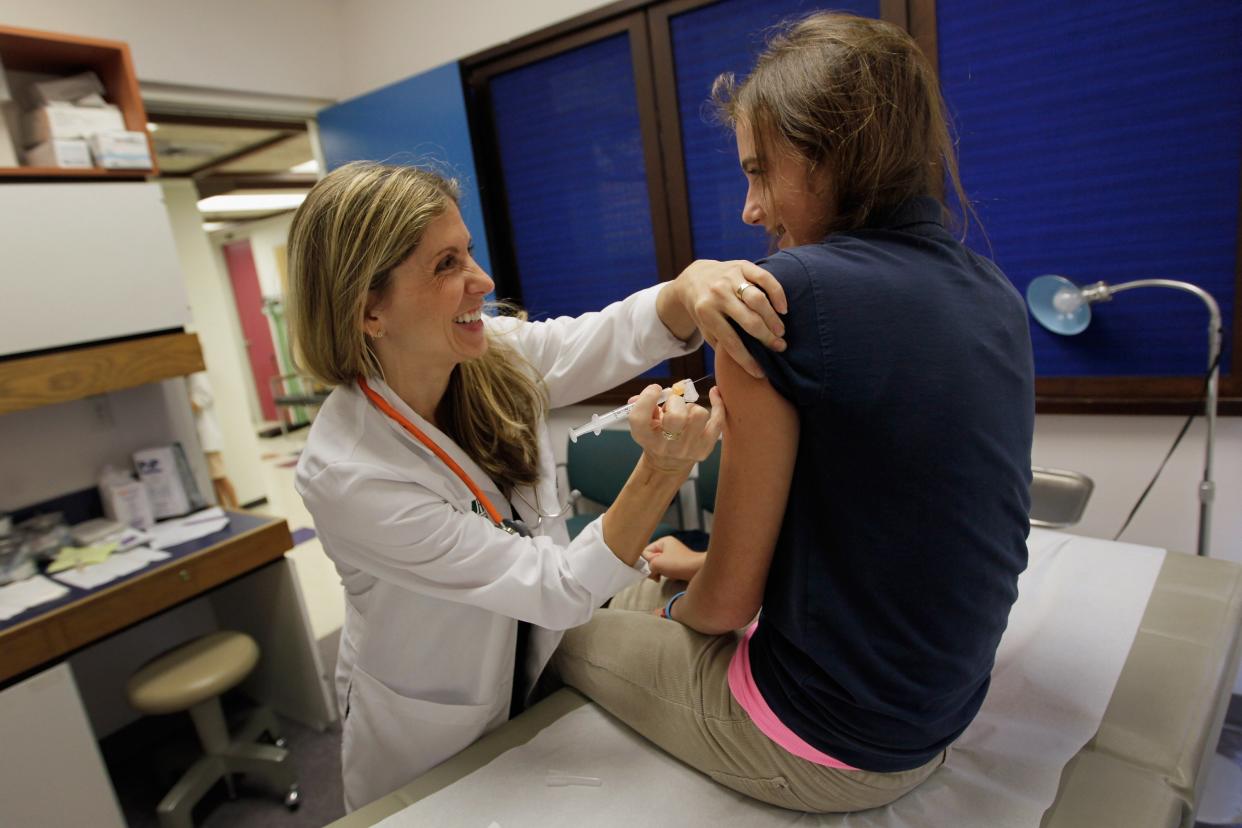 A pediatrician gives an HPV vaccination to a 13-year-old girl in Miami (Getty Images)