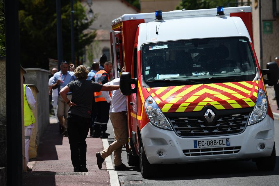 An ambulance arrives at the scene of Froome's crash last week. (Credit: Getty Images)