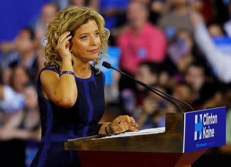 Democratic National Committee (DNC) Chairwoman Debbie Wasserman Schultz speaks at a rally, before the arrival of Democratic U.S. presidential candidate Hillary Clinton and her vice presidential running mate U.S. Senator Tim Kaine, in Miami, Florida, U.S. July 23, 2016. Picture taken July 23, 2016. REUTERS/Scott Audette