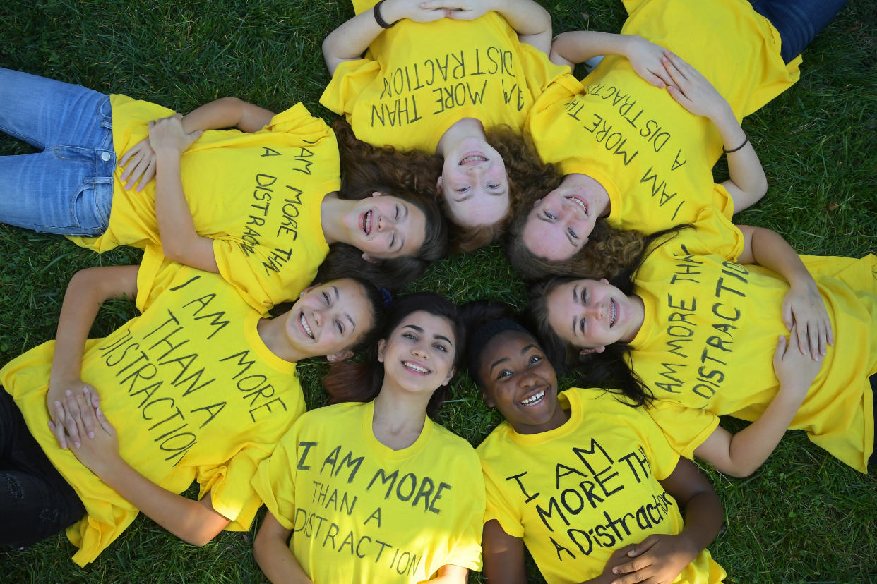 URBANA, MD - OCTOBER 30: Urbana Middle School girls wearing homemade T-shirts with "I am more than a distraction" clockwise from top Sophie Beers-Arthur, Sola Beers-Arthur, Allison Crittenden, Summer Campbell, Sophia Plaschke, Emma Sweeney, and Abby Carioti October 30, 2016 in Urbana, MD.  The  Frederick County middle school girls protested and spurred change and now are helping to rewrite the dress code at Urbana Middle School that they say unfairly discriminates against girls.               (Photo by Katherine Frey/The Washington Post via Getty Images)