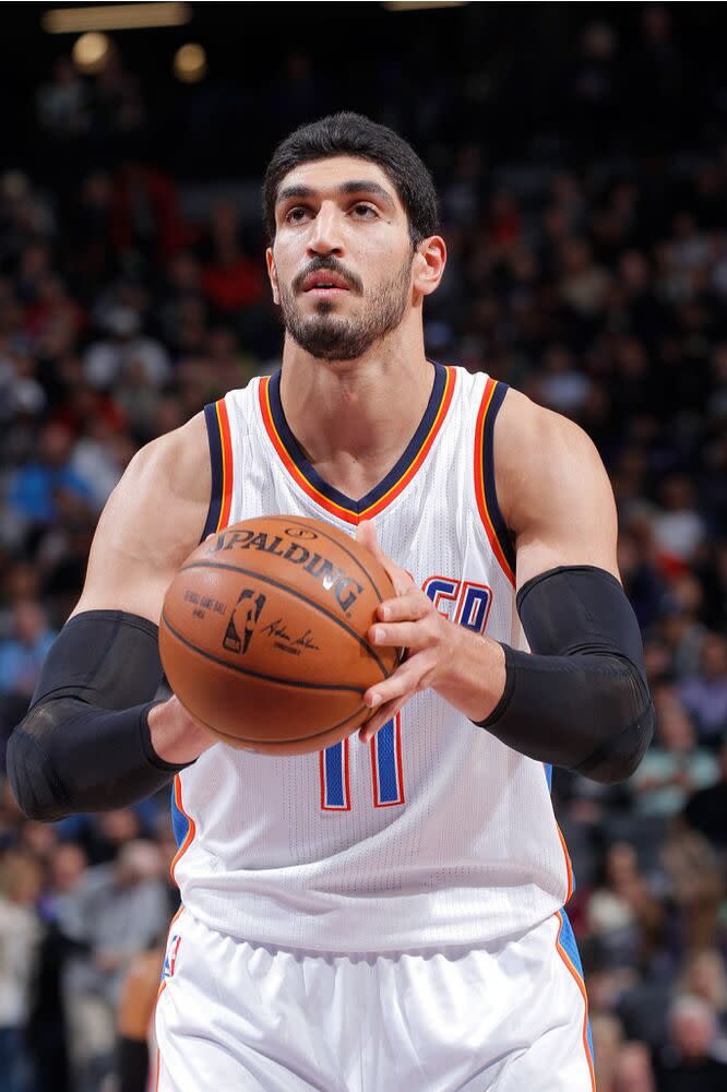 Enes Kanter with his former team | Rocky Widner/Getty Images