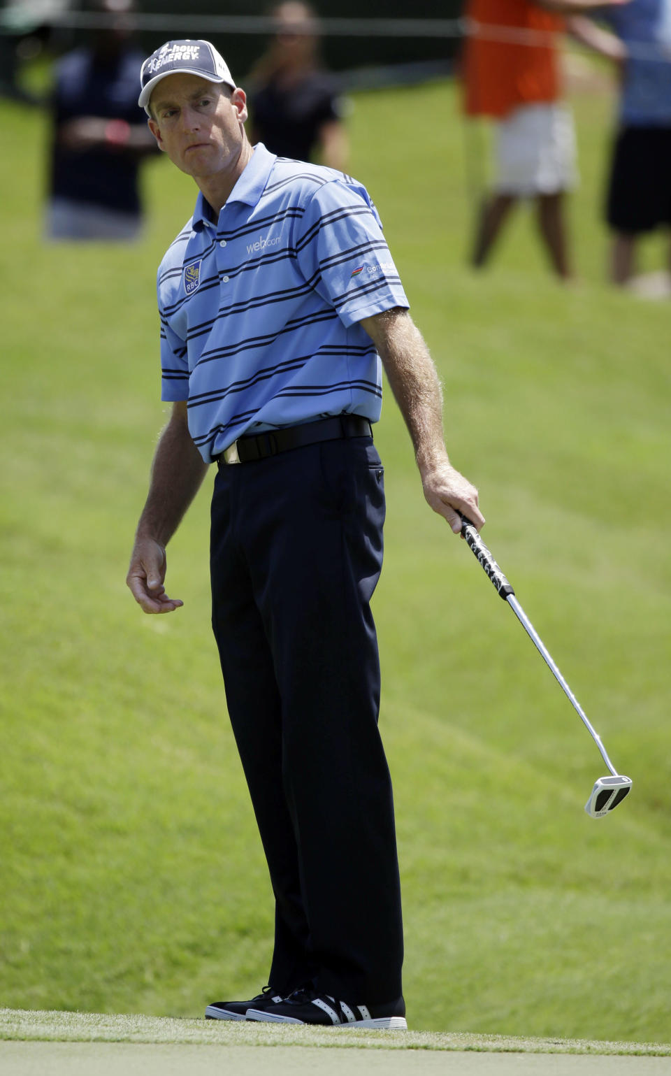 Jim Furyk reacts after missing a par putt on the ninth hole during the second round of The Players championship golf tournament at TPC Sawgrass, Friday, May 9, 2014, in Ponte Vedra Beach, Fla. (AP Photo/John Raoux)