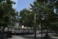 <p>A view of lower Manhattan from one of two reflecting pools at the National September 11 Memorial & Museum where the original One World Trade Center once stood, on Aug. 20, 2017. (Photo: Gordon Donovan/Yahoo News) </p>