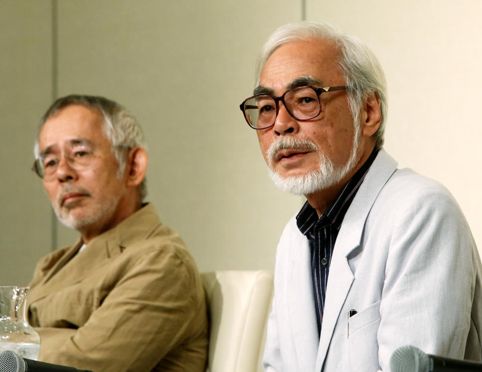 Japanese animation director Hayao Miyazaki (R) and Toshio Suzuki, chairman and producer. Studio Ghibli Inc., listen during a news conference in Tokyo, Japan, Sep, 6, 2013. Photo by Haruyoshi Yamaguchi (Photo by Yamaguchi Haruyoshi/Corbis via Getty Images)