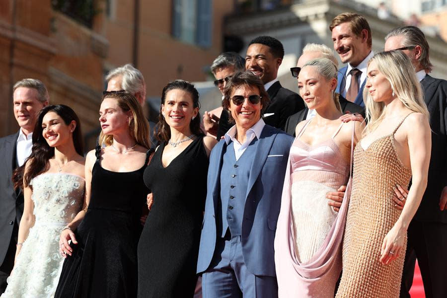 Tom Cruise (Center), a bevy of beautiful cast members, and Cary Elwes (Left) attend the global premiere of “Mission: Impossible – Dead Reckoning Part One” presented by Paramount Pictures and Skydance at The Spanish Steps in Rome. (Vittorio Zunino Celotto/Getty Images for Paramount Pictures)