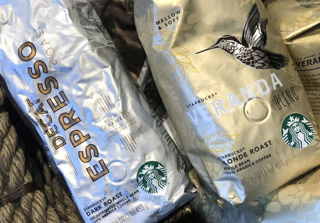 FILE PHOTO: Packages of Starbucks coffee for sale are seen displayed at a Starbucks coffee shop in New York City, New York, U.S., May 4, 2018. REUTERS/Mike Segar/File Photo